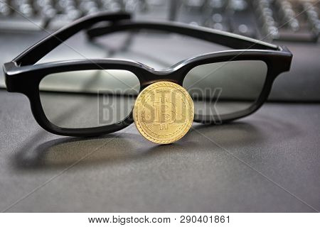 Bitcoin Cryptocurrency Concept.glasses And Desktop Keyboard At Background. Stock And Exchange Ocupat