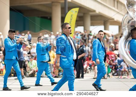 Indianapolis, Indiana, USA - May 26, 2018, Members of the Mexican themed dancing group, Ballet Folklorico Mosaicos, perform at the Indy 500 Parade