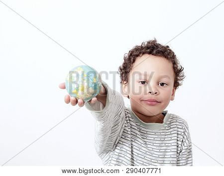 Boy Holding A Big Globe On His Head With White Background Stock Photo