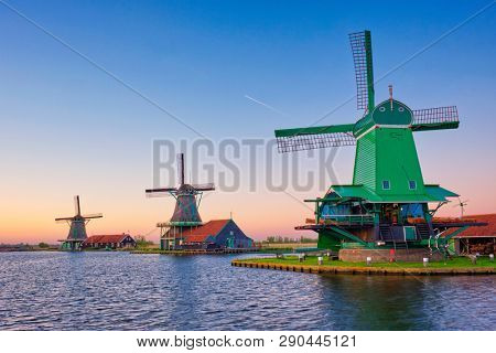 Netherlands rural lanscape - windmills at famous tourist site Zaanse Schans in Holland. Zaandam, Netherlands