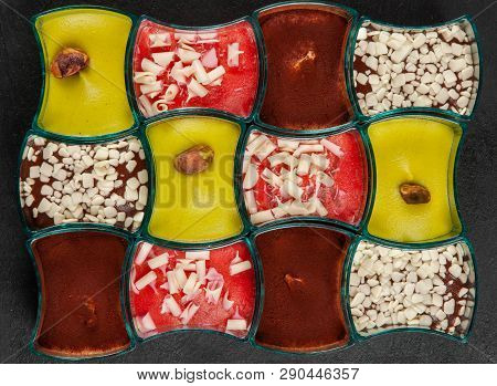 Mini Dessert, Tiramisu, Chocolate And Strawberry Dessert On Dark Background.