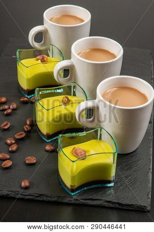 Mini Dessert And Coffee On Dark Background