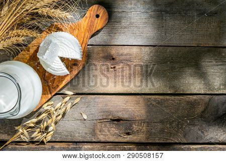 Shavout Concept - Grains, Milk And Cheese On Wood Background, Top View