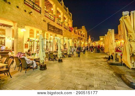 Doha, Qatar - February 17, 2019: Street View In Souq Waqif Market With Cafes And Restaurants And The