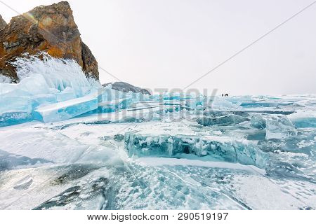 Cape Khoboy Rock On Olkhon Island, Lake Baikal, Ice Hummocks In Winter, Russia, Siberia