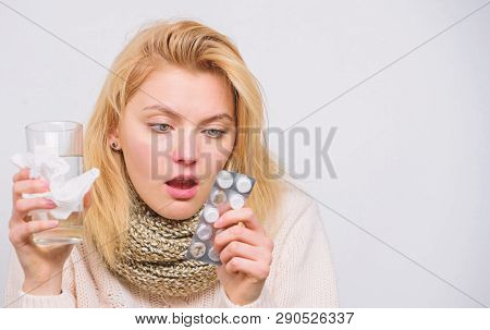 Breaking Fever Concept. Headache And Fever Remedies. Woman Sick Person Hold Glass Water And Tablets 