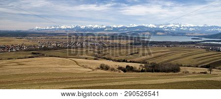 Reservoir Oravska Priehrada And High Tatras Mountains In Region Orava, Slovakia. Panoramic Landscape