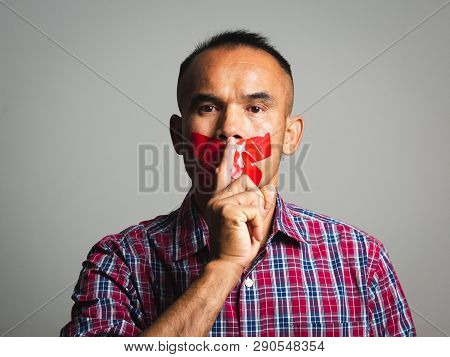 The Man Making Finger On Lips Silence Gesture, Pst, Shh,