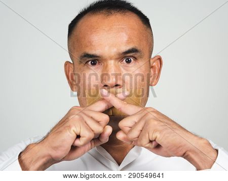The Man Making Finger On Lips Silence Gesture, Pst, Shh,