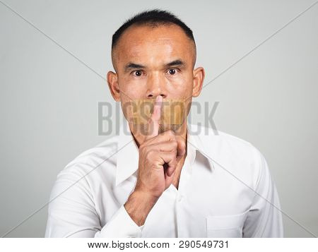 The Man Making Finger On Lips Silence Gesture, Pst, Shh,