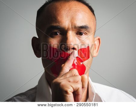 The Man Making Finger On Lips Silence Gesture, Pst, Shh,