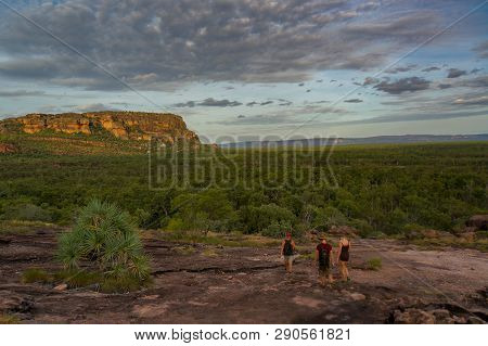 Tourists Walking Down From The Nadab Lookout In Ubirr, Kakadu National Park - Australia