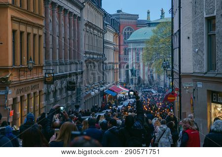 Stockholm, Sweden - Apr 30, 2018: Celebration Of Walpurgis Night, People Gathering On The Street Wit