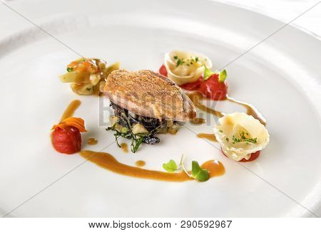 Quail Fillet, Olive, Basil, Red Pepper Puree And Tortellini With Artichoke.