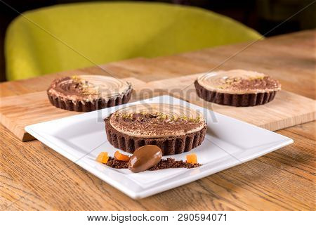 Homemade Chocolate Chili Tart - Chocolate Cream, Hazelnut Chantilly, Chili Ganache, Cocoa Biscuits.