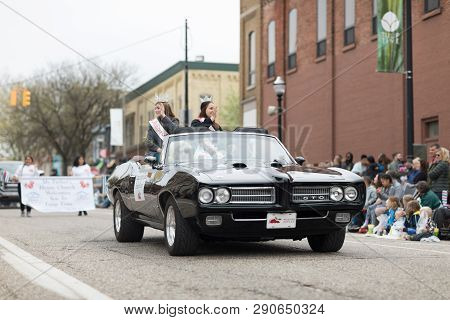 Holland, Michigan, Usa - May 12, 2018 Beauty Queens Riding On A Pontiac Gto Classic Car At The Muzie