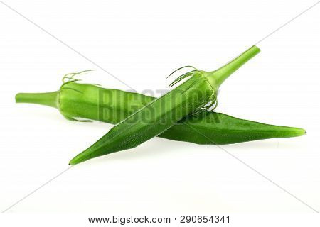 Organic Okra Fruit Isolated On White Background.