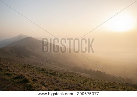 Beautiful Winter Sunrise Landscape Image Of The Great Ridge In The Peak District In England With Mis