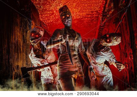 A Group Of Zombie Woman With The Flaming Eyes Is Going To Catch You. Halloween Theme.