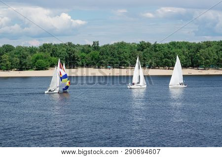 Regatta Competition On Lake River Sailing Yachts Boats With White Sails And Gennaker