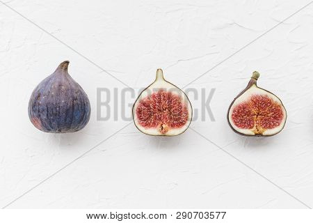Fresh Figs On A White Background. Healthy Snack And Food. Top View Of Figs. Place For Text.
