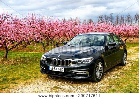 Auvergne-rhone-alps, France - March 15, 2019: Black Motor Car Bmw 520d (g30) At The Background Of Ch