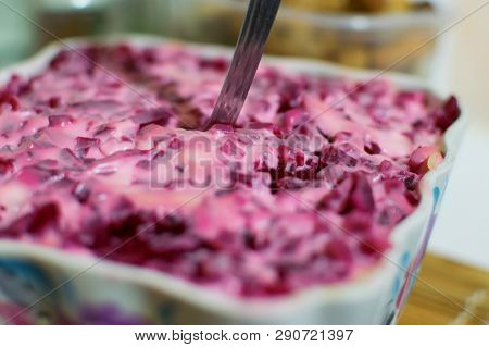 Salad With Beet On Celebration With Spoon Closeup Tasty