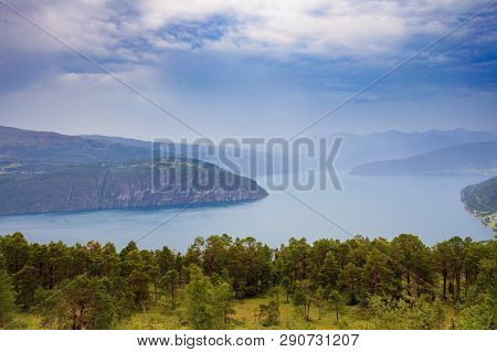 Norwegian Landscape. Green Mountains Hills And Fjord, Stormy Rainy Weather.
