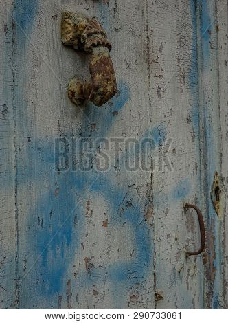 Villefranche De Rouergue, Midi Pyrenees, France - September 16, 2017: Old Rusty Knob On A Wooden Doo