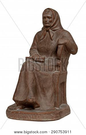 Ceramic Old Woman Sculpture On A White Background