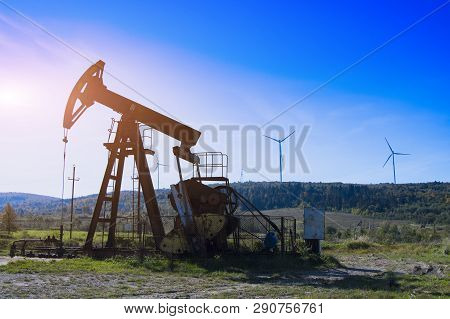 Oil Pump Is On A Background Mountains