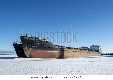Cargo Vessels At The Port In The Winter Parking