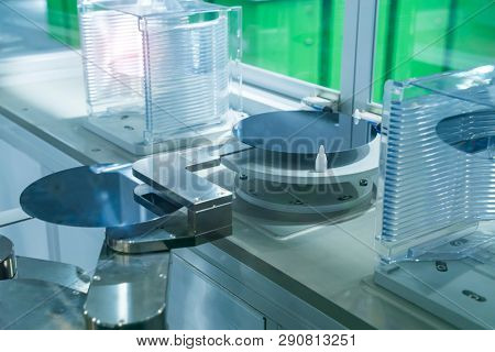 Silicon Wafers and Microcircuits with Automation system control application on automate robot arm