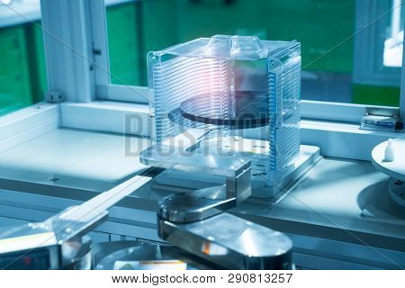Silicon Wafers and Microcircuits with Automation system control application on automate robot arm