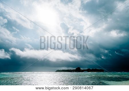 Maldives Background. Sunset Over The Tropical Sea And Coral Beach With Colorful Clouds In The Sky. B