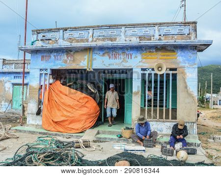 Fishermen Working With Fishing Nets