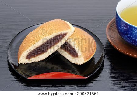 Dorayaki, Japanese Confectionery On Wooden Tray, On Black Table