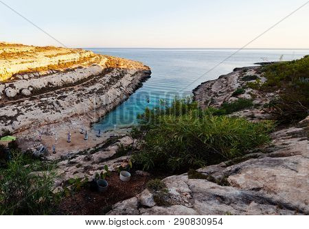 Lampedusa, Italy - July, 29: View Of Cala Greca At Sunset In The Summer Season On July 29, 2018
