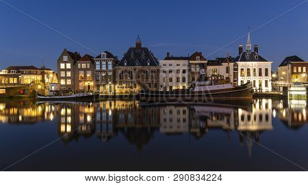 Maassluis, The Netherlands - February 26, 2019: The Harbor Of Maassluis With Old Boats, Tugs And Mon