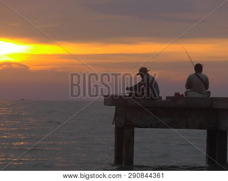 Port Dickson, Malaysia September 14, 2018 :  Jetty And Unidentified People Closeup During Sunset At 