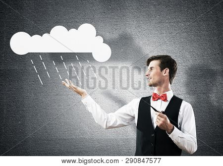 Horizontal Shot Of Confident And Young Businessman In Smart-casual Wear Smoking Pipe And Presenting 