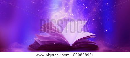 An Open Book With A Magical Fantasy. Night View Illustration With A Book. The Magical Power Of Readi