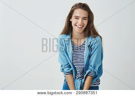 Smiling Attractive Happy Young Girl Laughing Carefree Having Fun Grinning Joyfully Bending Forward C
