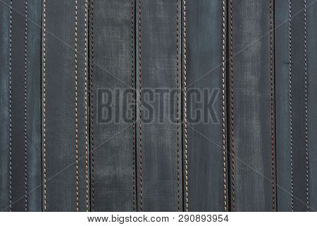 Grey Leather Vertical Straps Close-up. Leather Straps Background.
