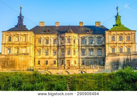 Pidhirtsi, Ukraine - July, 2017: Medieval Pidhirtsi Castle In Sunset Summer Light, Pidhirtsi Village