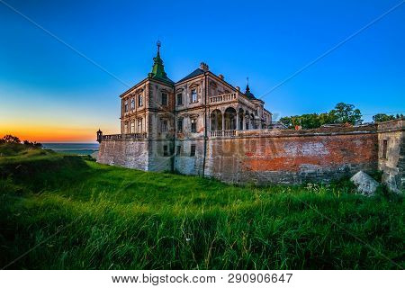 Pidhirtsi, Ukraine - July, 2017: Medieval Pidhirtsi Castle On Sunset, Pidhirtsi Village, Lviv Region