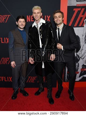 LOS ANGELES - MAR 18:  Iwan Rheon, Machine Gun Kelly and Douglas Booth arrives for the Netflix 'The Dirt' Premiere on March 18, 2019 in Hollywood, CA                