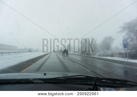 Highway Snowstorm Scene From The Dashboard Of Car Looking Onto I-75