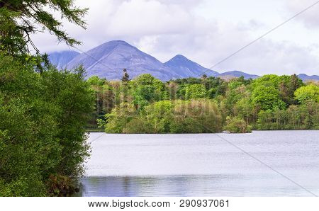 The Paps Of Jura, Large Mountains On The Island Of Jura In Scotland, Are Seen From Loch Ballygrant O
