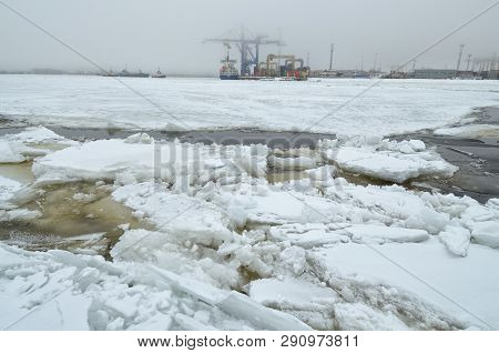 Spring Has Come.the Ice In The Lake Began To Melt.pieces Of Ice Float On Water, Forming An Ice Drift